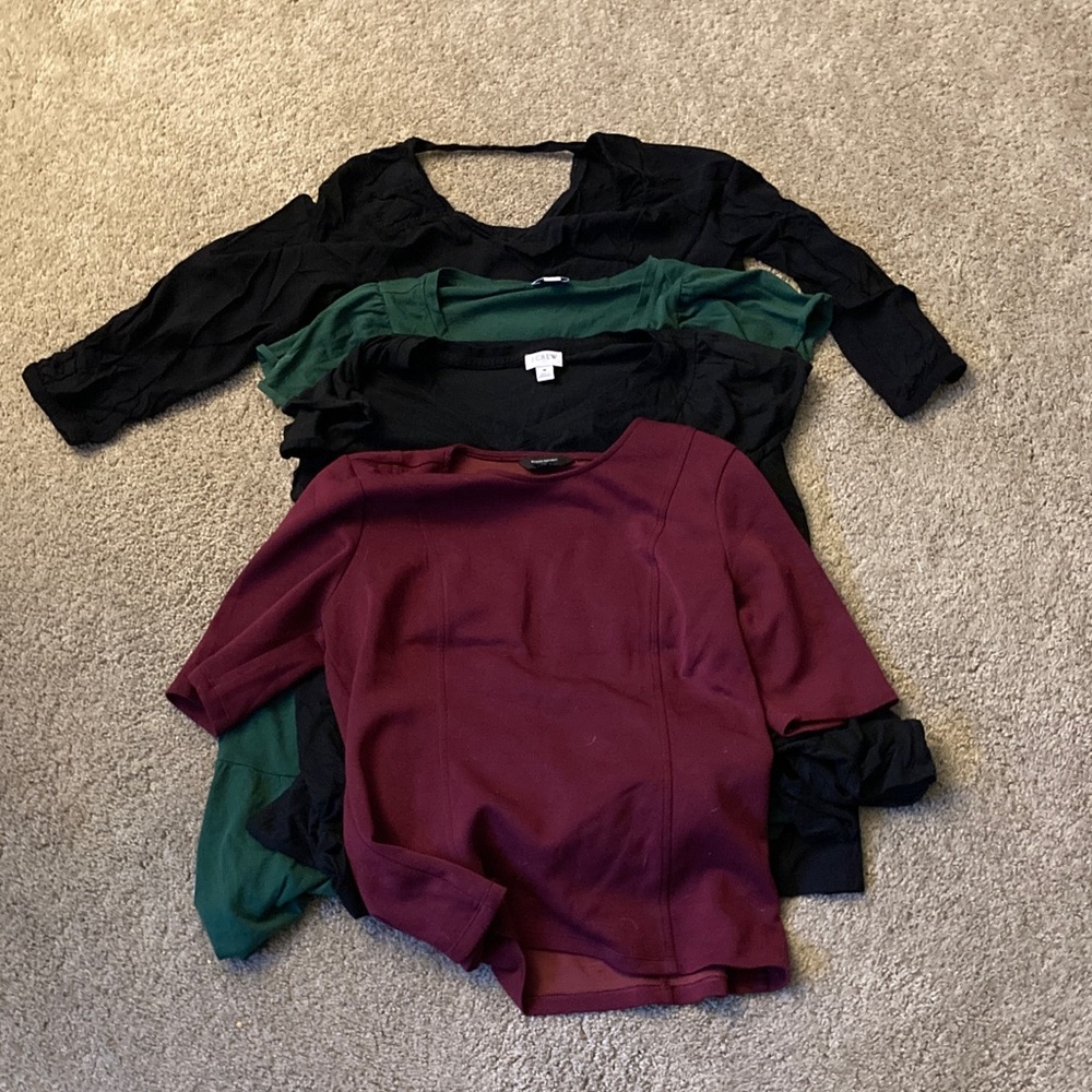 Bundle of women’s shirts and dresses